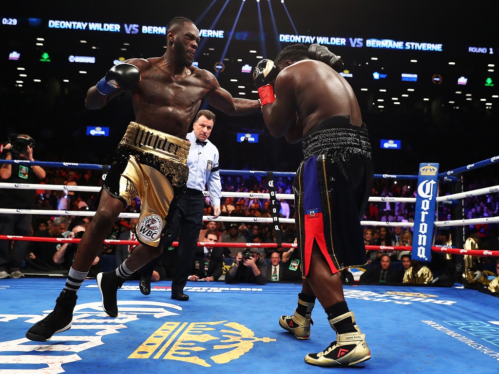 Deontay Wilder (à gauche)