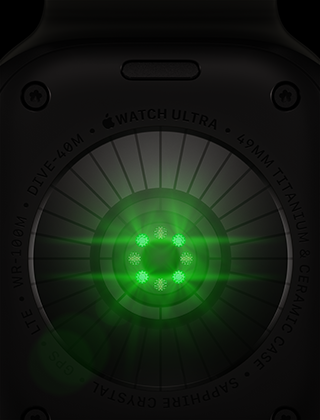 Dos de l’Apple Watch Ultra 4, boîtier en titane, noir, plusieurs capteurs ronds avec LED vertes allumées