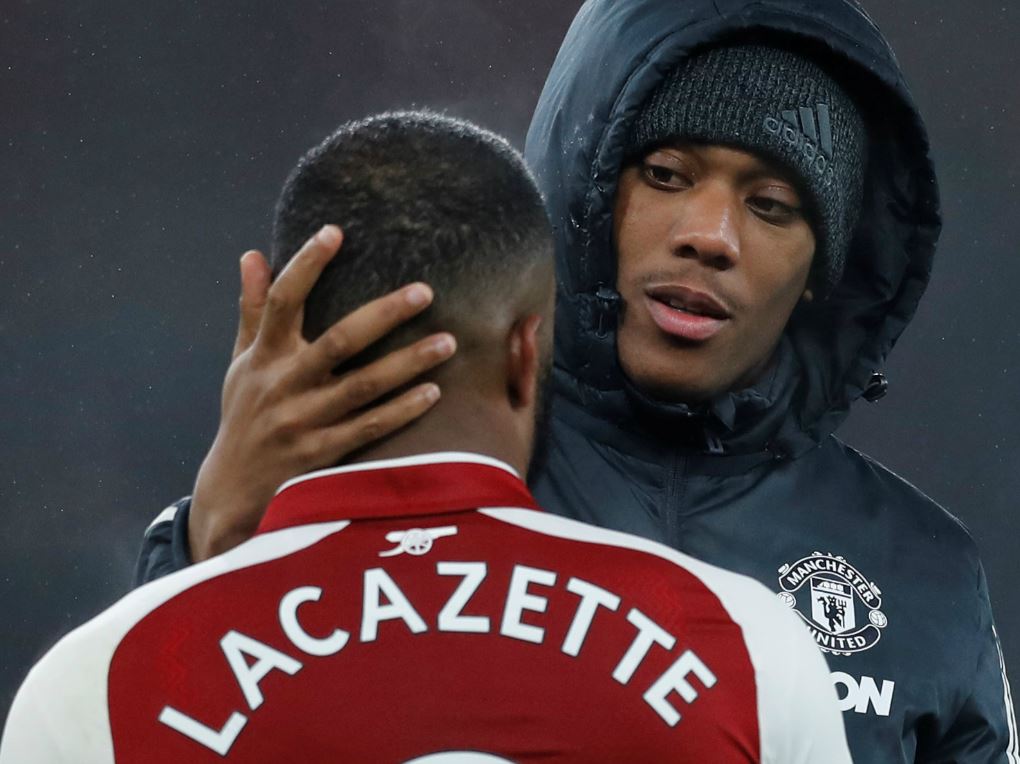 Anthony Martial (de face) et Alexandre Lacazette